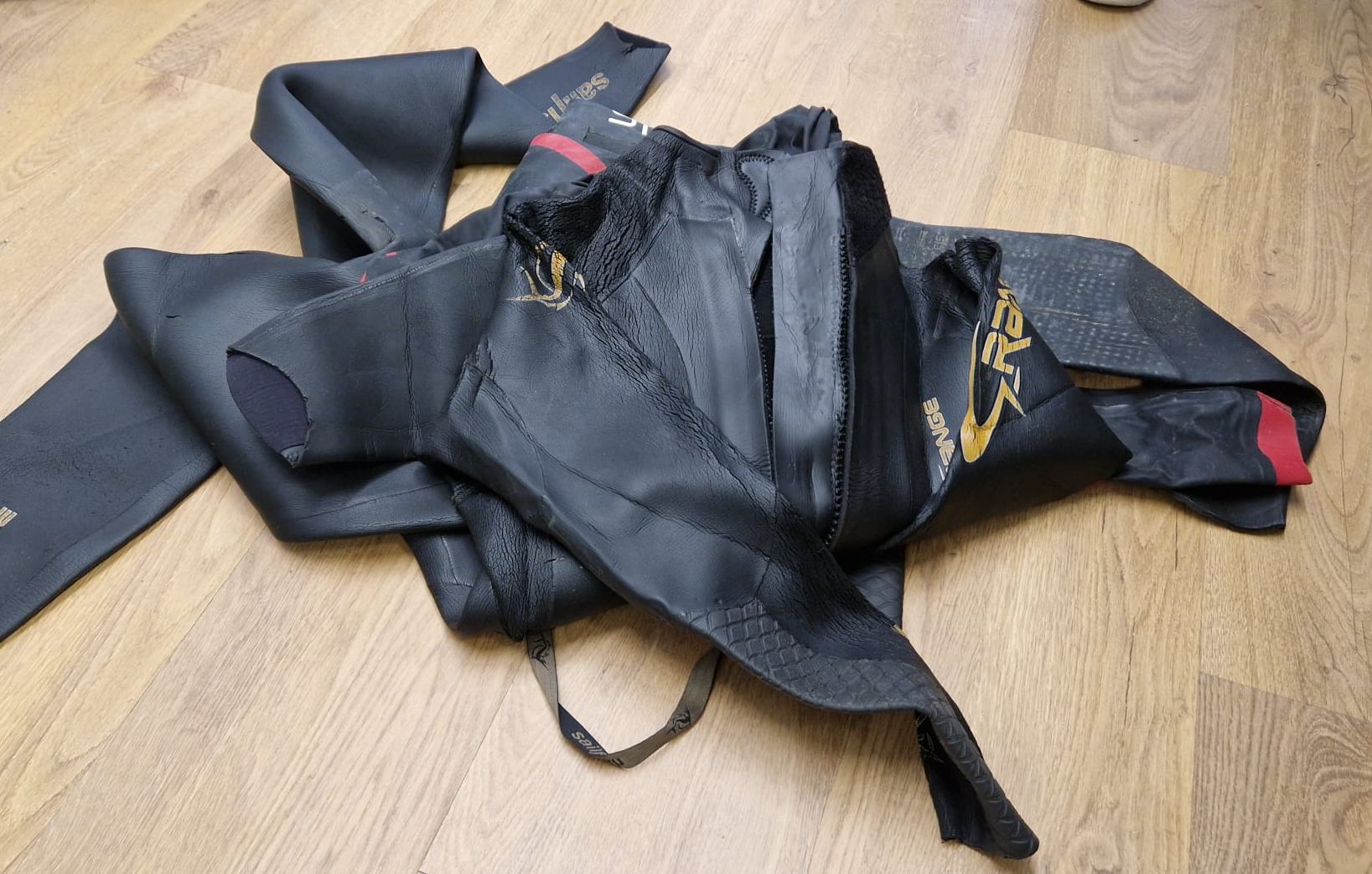 unwanted wetsuits ready for recycling